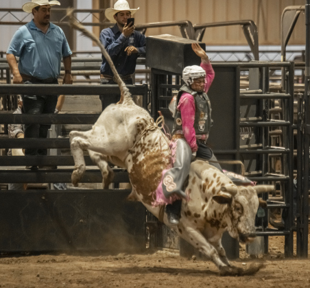 Bryden Gonzalez competes in Bull Riding at the 1st Annual Bill Pickett Youth Rodeo, held at the Williamson County Expo Center  on Saturday, June 15, 2024.   The rodeo was open to entrants 18-years-old or younger.    Photo by Andy Sharp.