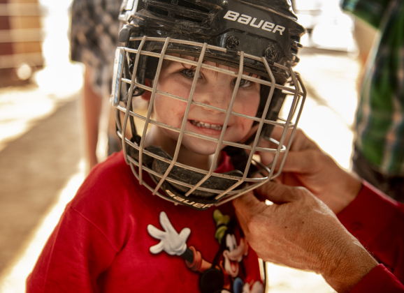 3-year-old Braddox Anderson, the event's youngest entrant, gets suited up  to compete in Mutton Bustin' at the 1st Annual Bill Pickett Youth Rodeo, held at the Williamson County Expo Center  on Saturday, June 15, 2024.   The rodeo was open to entrants 18-years-old or younger.    Photo by Andy Sharp.