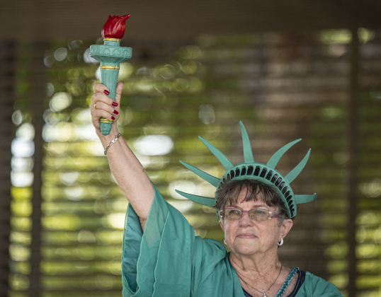 Ronda McCauley, with the Vacation Liberty School at Heritage Baptist Church in Georgetown, was Lady Liberty during the 4th of July celebration in San Gabriel Park on Thursday, July 4, 2024.  The Georgetown Sertoma Club sponsors the 4th of July Freedom Festival each year in San Gabriel Park.  Photo by Andy Sharp.