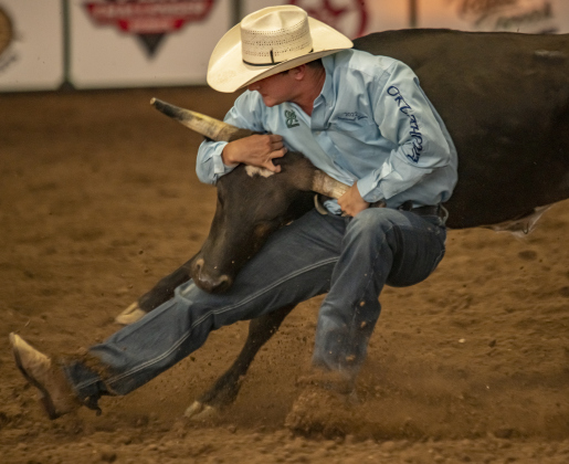 Hazen Sparks of Talihina, Oklahoma takes part in Steer Wrestling.