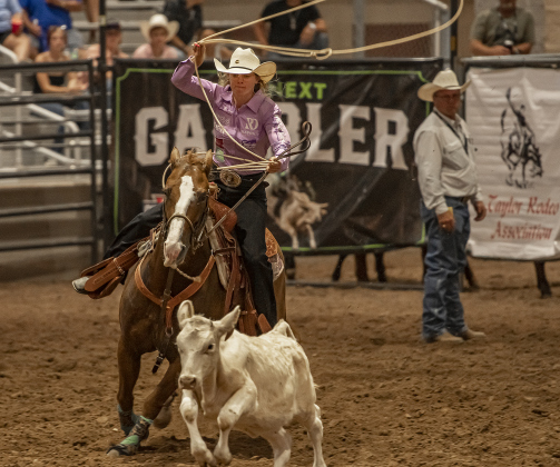 Jimmie R. Smith of McDade, Texas competes in Breakaway Roping.