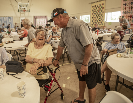 Ethel Mickan and Jerry Birkelbach share some good stories while taking part in the Hamburger Fundraiser held at St. Peter Lutheran Church on Saturday, June 22, 2024.   The fundraiser was held to raise funds for work on the church parsonage.   The church is located on FM 972 near FM 1105.