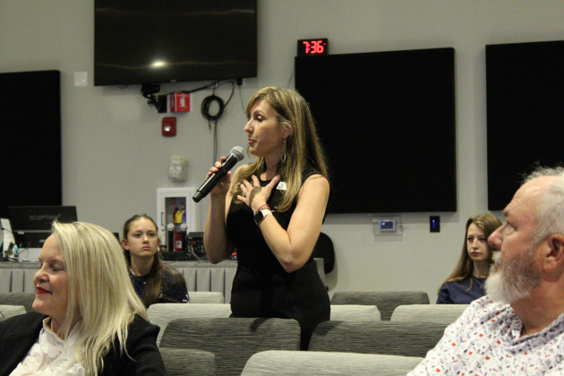 Leander Mayor Christine DeLisle answers a resident’s question during the meeting. Photo by Nalani Nuylan.