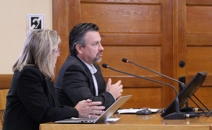 County Tax Assessor Larry Gaddes, back, and County Auditor Julie Kiley, front, present the proposed tax rates for FY 25. Photo by Nalani Nuylan.