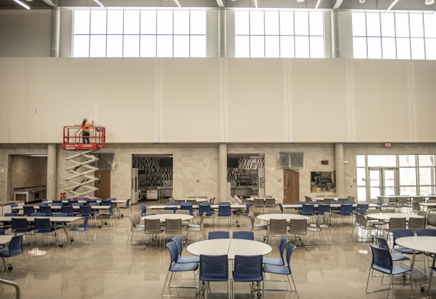 Finishing touches are done on a wall in the cafeteria at the new Benold Middle School on Monday, August 5, 2024 The school, along with San Gabriel Elementary School, are two schools that open their doors to students on August 15.  Photo by Andy Sharp