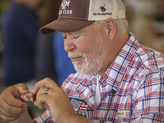 Mike Erickson, the Culinary Arts Instructor at Taylor High School  was one of the Ribs Category judges during the 45th Taylor International BBQ Cook-Off on Saturday, August 17, 2024.  Erickson is also director of the National High School Barbecue Association.  Held at Murphy Park, the event, attracting entrants from all over Texas, continued through Saturday.    Photo by Andy Sharp.