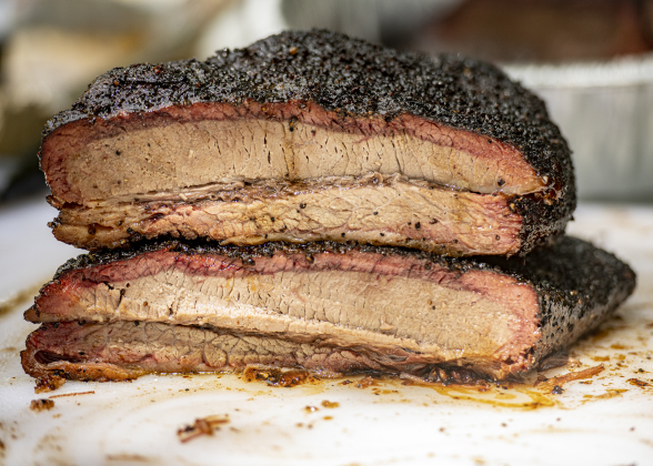 Briskets smoked by Drew Clinkscales and Matt Bishop, with the  M &amp; D Texas BBQ team, are prepared for judging at  the 45th Taylor International BBQ Cook-Off on Saturday, August 17, 2024. These briskets were smoked for 16-18 hours.  Held at Murphy Park, the event, attracting entrants from all over Texas, continued through Saturday.    Photo by Andy Sharp.