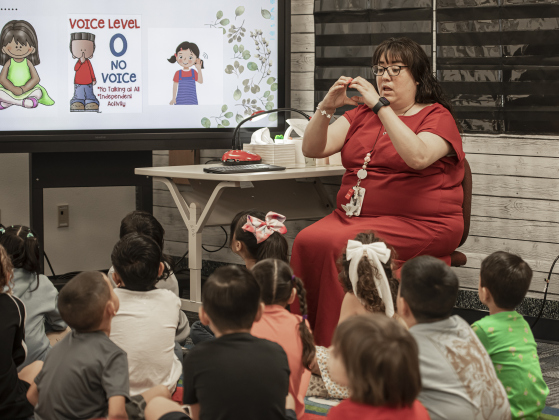 Teacher Emily Luna spends time with her kindergarten class  at Cooper Elementary on Thursday morning, August 15, 2024,  the first day of school.   Cooper Elementary has 572 students enrolled this year.    Photo by Andy Sharp.