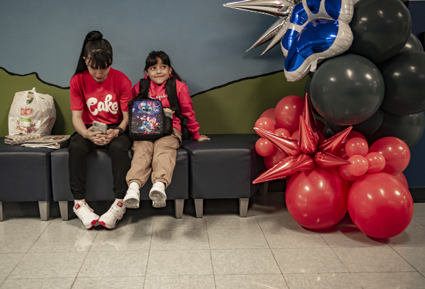 9-year-old  Laurimart Cardenas, right, spends time with her mom Yessika Sanchez before going to her fourth grade classroom at Cooper Elementary on Thursday morning, August 15, 2024,  the first day of school.   Cooper Elementary has 572 students enrolled this year.    Photo by Andy Sharp.