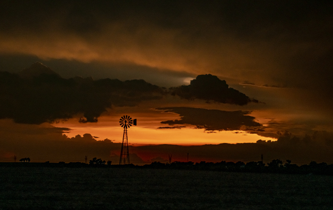 Storm clouds gather over a field along County Road 339  on Friday, August 23, 2024.    Photo by Andy Sharp.