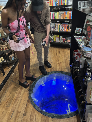The building features a well in the floor that is original to the 1920s building. It has been sealed with glass and can bear the weight of five people.