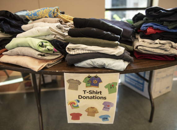 Donated t-shirts are ready to be transformed into bags during a 9/11 National Day of Service event held at Georgetown's Christ Lutheran Church on Saturday, September 7, 2024.  Volunteers from churches, synagogues and mosques, including some who just wanted to contribute,  helped repurpose t-shirts to be used as bags at The Caring Place, Helping Hands of Georgetown and the Carver Center for Families.   Photo by Andy Sharp.