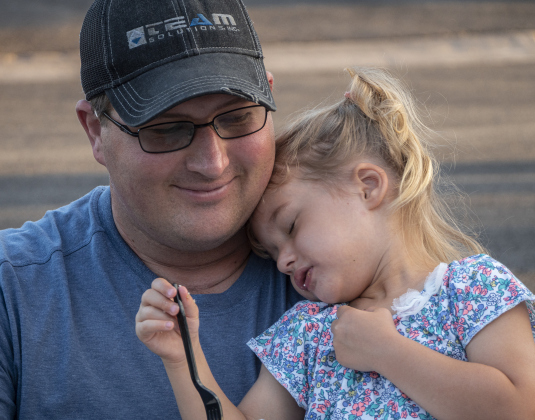 Christopher Klaus and his daughter Michaela, 2 (two-and-a-half if you want to go with that, but 2 sounds good),  were at Founders Park for a First Friday concert by Landrum Turner and The Boys From Tejas Meat Supply on Friday, September 6, 2024. The monthly free concert temporarily moved to this location while the Williamson County Courthouse grounds are closed.   Photo by Andy Sharp.