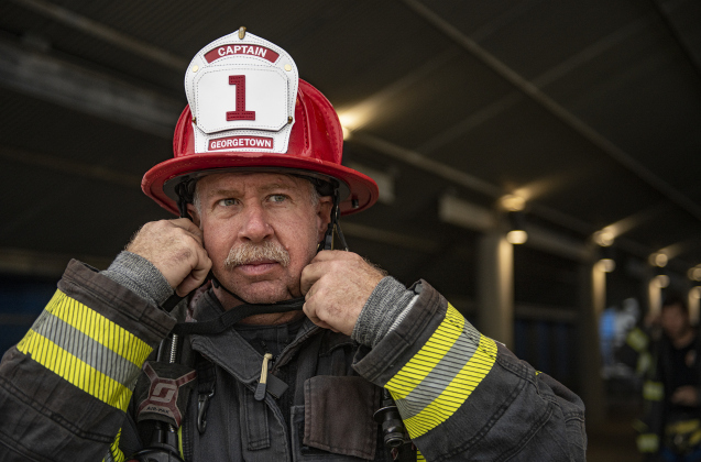 Georgetown Fire Department Captain Brad Cox prepares to take part in  Memorial Stair Climb at Birkelbach Field on Wednesday, September 11, 2024, the 23rd anniversary of the attacks on United States soil in New York, Pennsylvania and Washington, D.C.  The Memorial Stair Climb began here in 2011.  Photo by Andy Sharp.