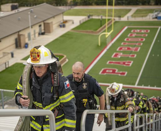 Georgetown Fire Chief John Sullivan and Police Chief Cory Tchida take part in  the Memorial Stair Climb at Birkelbach Field on Wednesday, September 11, 2024, the 23rd anniversary of the attacks on United States soil in New York, Pennsylvania and Washington, D.C.  The Memorial Stair Climb began here in 2011.  Photo by Andy Sharp.