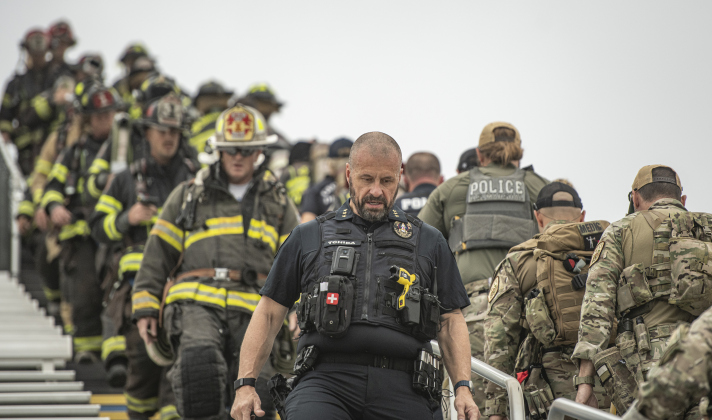Georgetown Police Chief Cory Tchida takes part in the Memorial Stair Climb at Birkelbach Field on Wednesday, September 11, 2024, the 23rd anniversary of the attacks on United States soil in New York, Pennsylvania and Washington, D.C.  The Memorial Stair Climb began here in 2011.  Photo by Andy Sharp.