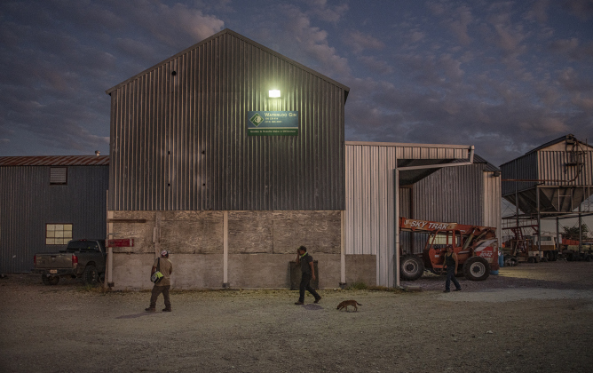 Workers head home after another day's work  at Waterloo Gin on Monday, September 9, 2024. Located on County Road 414 east of Taylor, the gin is co-owned by Clement Strmiska and David Woollett.   Photo by Andy Sharp.