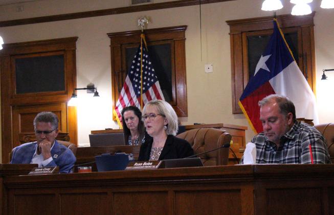 County Commissioner Valerie Covey, center, explains her reason for adding personnel to handle Child Protective Services cases in Williamson County during the September 17 meeting. Photo by Nalani Nuylan.
