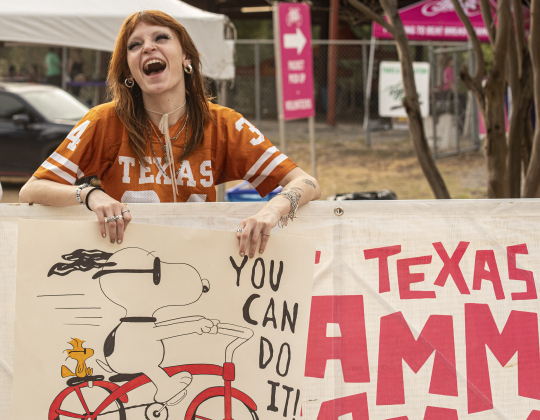 Sydney Shoemaker, 21, daughter  of cyclist Lisa Shoemaker, brought a sign to encourage her mom during her 25-mile  for the annual Mamma Jamma Ride starting and finishing at Murphy Park  on Saturday, September 21, 2024. Shoemaker was doing a 25-mile ride.