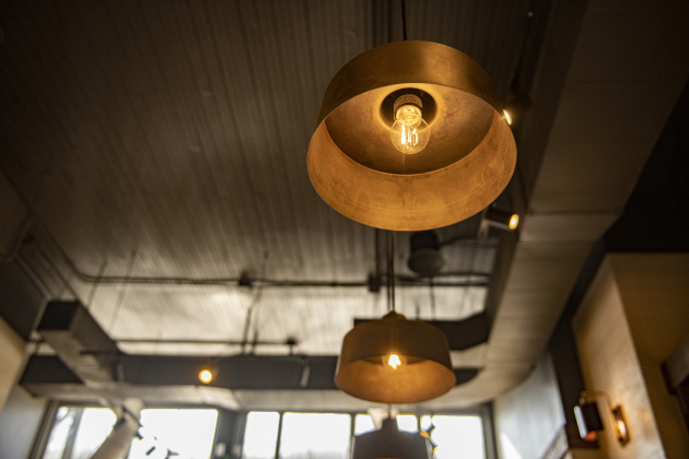Modern light fixtures are a highlight of the shopping area at  Tecovas  on Thursday, September 19.