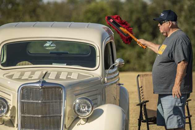 Craig Lamb polishes his 1935 Ford during the car and motorcycle show held at the the College Street VFW Post 8587 on Saturday, September 21, 2024.   This is the post's inaugural car show.   Photo by Andy Sharp.