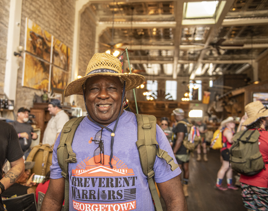 Army veteran Jeffery Robinson joined fellow veterans for a brief stop at Mesquite Creek Outfitters before his Irreverent Warriors group continued their 6.1 mile Silkies Hike through Georgetown on Saturday, September 21, 2024.  The hike began and concluded at VFW Post 8587 on College Street.