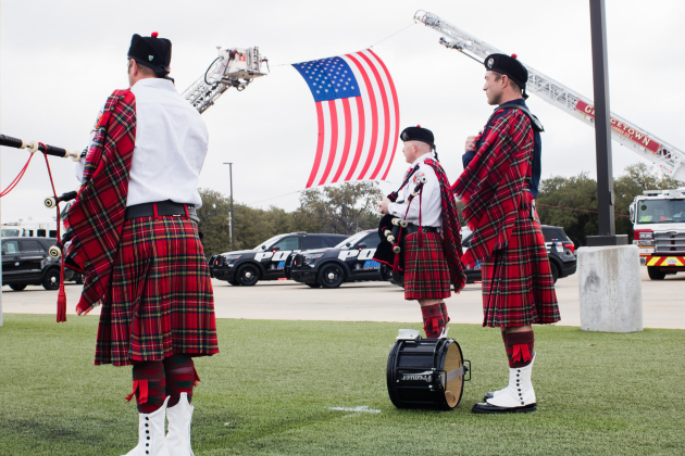 The Georgetown Fire Department Pipes and Drums play at a police memorial in 2021.