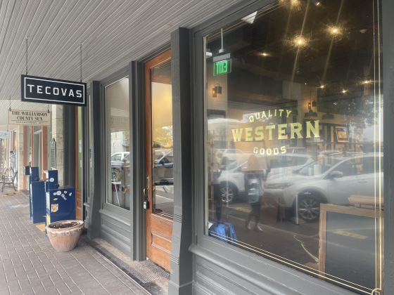 With windows cleared and interior work complete, inventory can be seen through the storefront window on Main Street in Georgetown. Inventory for Tecovas was moved in over the weekend, ahead of the soft opening September 25. Photo by Nicholas Cicale
