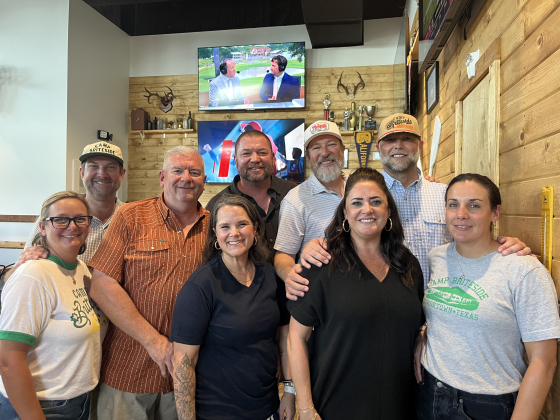 The Gold Bird Family investors include, (back row, from left) Brad Strittmatter, Tommy McCormick, Troy Hellmann, Cody Hirt, Tim Carr, (front row, from left) Stacey Strittmatter, Melissa McCormick, Jordana Hirt and Haley Carr.