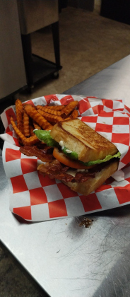 BLT sandwich with sweet potato fries at The Cotton Country Club. Photo courtesy of Emily Hamilton