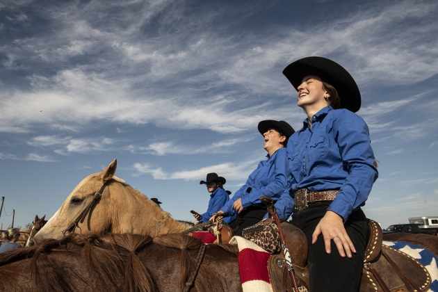 Gabri Alvarez, 15, front, riding her horse named Chuck, is joined by 14-year-old Reagan Roppolo, astride her horse called Cash, as they get ready to take part in the Grand Entry at the 30th Clayman Rodeo on Saturday, October 7, 2023.  The rodeo, held at Windsong Farm, is hosted by Jim Bob and Kelly Clayman, who've taught rodeo and equestrian skills here for many years.    Photo by Andy Sharp.