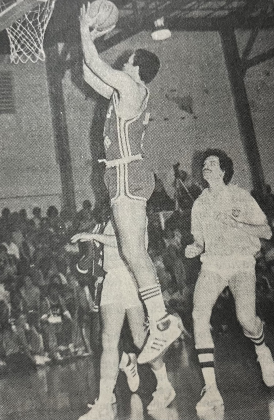 Butch Johnson goes up for two points for the Dallas Cowboys affiliated "Hoopsters" in the game against the Georgetown Sertoma Club. Johnson contributed only 4 points, but he gave his share in crowd-pleasing entertainment. Photo taken on March 27, 1982.