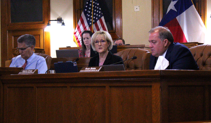 Commissioner Valerie Covey, center, explains the need for a Program Manager for the Justice Center project during the October 22 meeting. Photo by Nalani Nuylan.