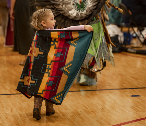3-year-old Scarlett Keogh donned a blanket and danced along when audience members were invited to join in a dance during the 2024 Georgetown Powwow, held Saturday, September 28, 2024 at the Boys and Girls Club of Georgetown.  Sponsored by GTX Connect, this is Georgetown's first Powwow since the event  was last held at Southwestern University in 2019.  Photo by Andy Sharp.