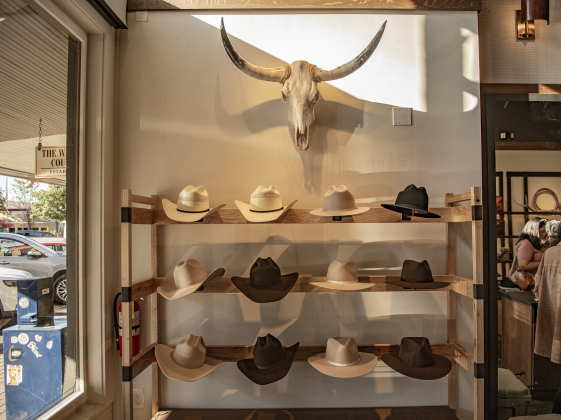A collection of hats were on display near the entrance at  Tecovas Grand Opening  on Friday, September 27, 2024.  The store is along Main Street, in the area under the Williamson County Sun offices.   Photo by Andy Sharp.