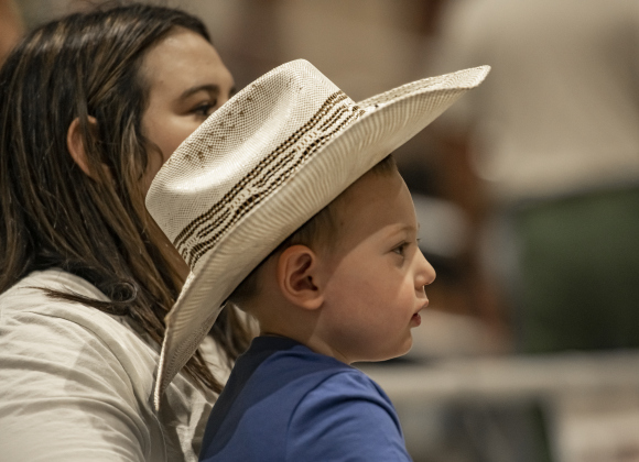 Kelsey Sunvison and her son Brooks, 3, enjoyed their time together  at the Williamson County Fair Rodeo  on Friday, October 25, 2024.   Photo by Andy Sharp.
