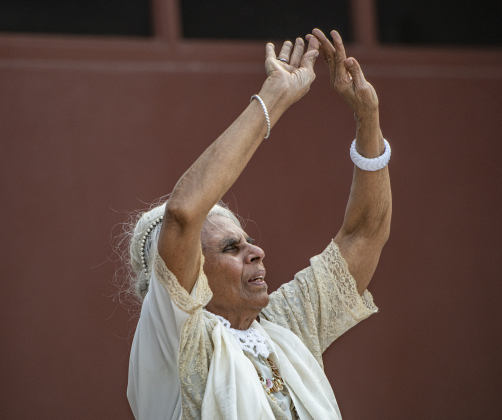 91-year-old Agnes Fernendo does a miming performance for attendees during a National Night Out event held on Tuesday, October 1, 2024 at the Georgetown Housing Authority Activity Learning Center on West 18th Street.    Photo by Andy Sharp.