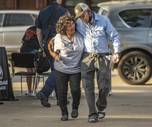 Felipa Martinez and Tom Flores enjoyed their evening  during a National Night Out event held on Tuesday, October 1, 2024 at the Georgetown Housing Authority Activity Learning Center on West 18th Street.    Photo by Andy Sharp.