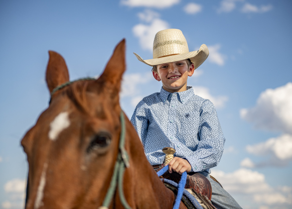 9-year-old Ashton Clayman sits astride his horse Tally at the 31st Annual Clayman Rodeo on Saturday, October 5, 2024.  Held at Windsong Farm, the rodeo was founded by Kelly and Jim Bob Clayman.    Photo by Andy Sharp. 
