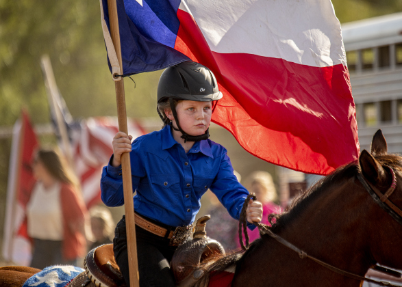 Lexi Miller, 10,  gets ready for the Grand Entry at the 31st Annual Clayman Rodeo on Saturday, October 5, 2024.  Held at Windsong Farm, the rodeo was founded by Kelly and Jim Bob Clayman.    Photo by Andy Sharp.