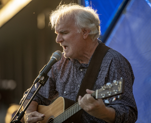 Ken Covington sings and plays his guitar during a First Friday Concert held at Founders Park on Friday, October 4, 2024.  Covington, founder of Kenz Guitars,  suffered a stroke in September 2023.  He's been on the mend for the past year.  He was honored with a proclamation presented by Georgetown Mayor Josh Schroeder.   Photo by Andy Sharp.
