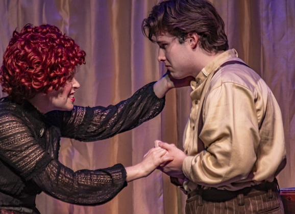 Sarah Jordan, as Mrs. Lovett, and Che Greeno, as Tobias Ragg, are pictured during a Thursday, October 3, 2024 dress rehearsal of "Sweeney Todd," playing on the Springer Stage at the Georgetown Palace through November 3rd.    Photo by Andy Sharp.