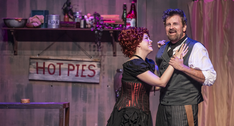 Sarah Jordan, as Mrs. Lovett, and Damon Brown, playing Sweeney Todd, are pictured during a Thursday, October 3, 2024 dress rehearsal of "Sweeney Todd," playing on the Springer Stage at the Georgetown Palace through November 3.    Photo by Andy Sharp.