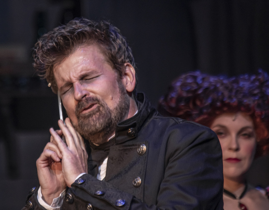 Damon Brown, playing Sweeney Todd, and Sarah Jordan, as Mrs. Lovett, are pictured during a Thursday, October 3, 2024 dress rehearsal of "Sweeney Todd," playing on the Springer Stage at the Georgetown Palace through November 3rd.    Photo by Andy Sharp.