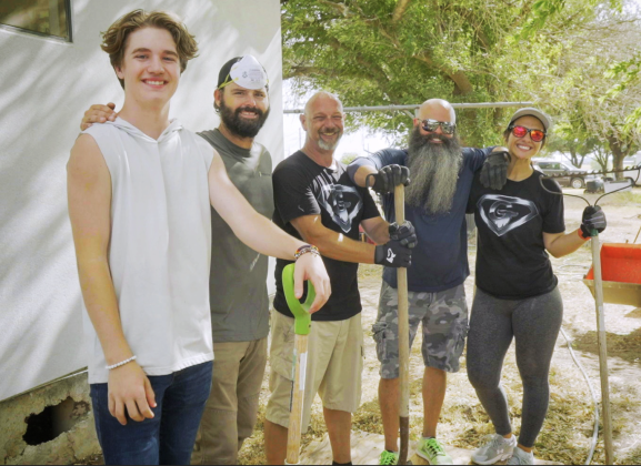 The Beard Club helps rebuild a home for an elderly couple in July 2022. (Left to right) are Jayden Ridings, Chris Hamilton, Steve Hall, Rob Kiddie and Julia Manning.