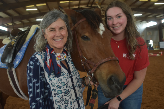 ROCK founder Nancy Krenek, left, and volunteer Gabby Guinn with Grant, an equine therapy-trained horse.