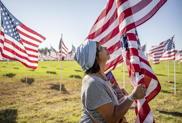 Bonita Brant posted a flag honoring several family members who served in the military on Saturday, November 9, 2024, the official opening day of the Field of Honor.   Sponsored by the Rotary Club of Georgetown, the Field of Honor includes 2,000 American flags covering ten acres in San Gabriel Park.  With events throughout the week, the flags will fly here until November 17th.   Photo by Andy Sharp.