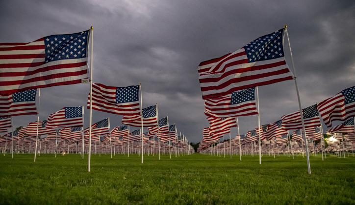 Flags billow in the wind  at the Georgetown Field of Honor on  Friday, November 8, 2024.  Sponsored by the Rotary Club of Georgetown, the Field of Honor includes 2,000 American flags covering ten acres in San Gabriel Park.  With events throughout the week, the flags will fly here until November 17th.   Photo by Andy Sharp.