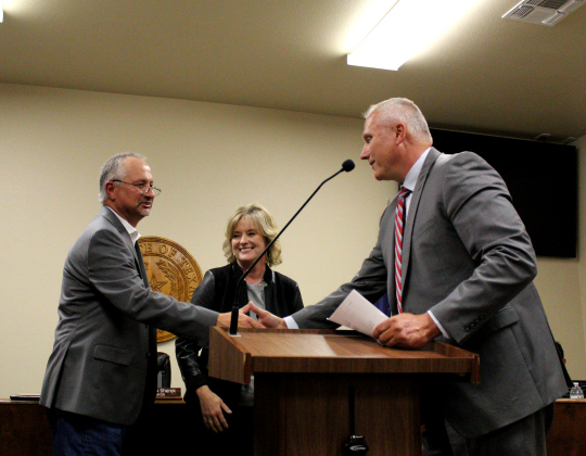 Mr. Klepac shakes hands with Judge Matthews, thanking him for swearing him into office for another term.