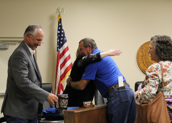 Ms. Allen hugs Jarrell resident Charles Ashdy after she takes her seat on the dais. This is Ms. Allen’s first term in office.